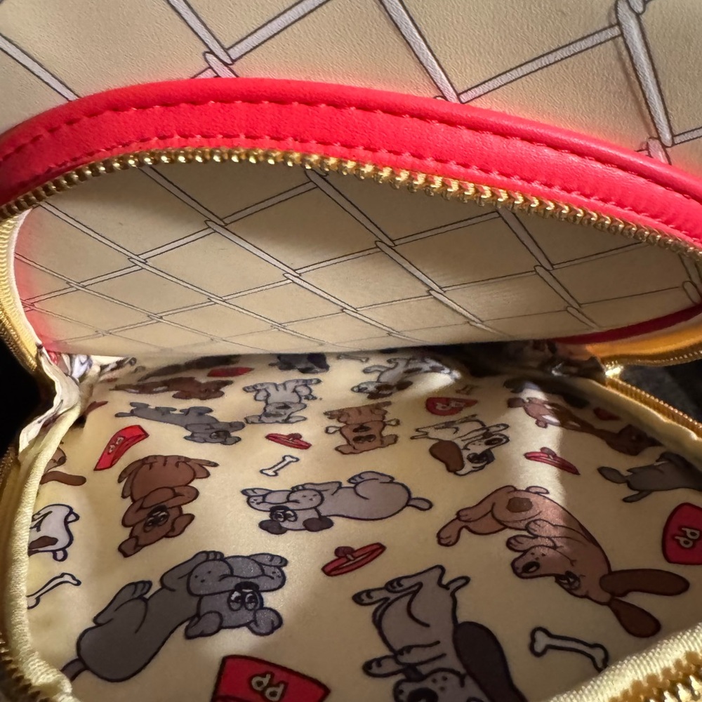 Loungefly Pound Puppies Yellow and Cream Backpack - Picture 10 of 11